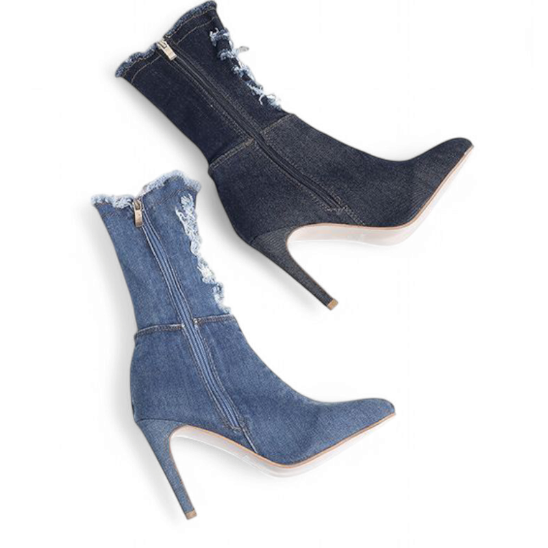 Flat-lay of two denim boots in light and dark washes, highlighting side zips and slim heels.

