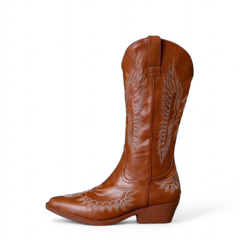 Side profile highlighting stacked mid heel and tapered square toe.