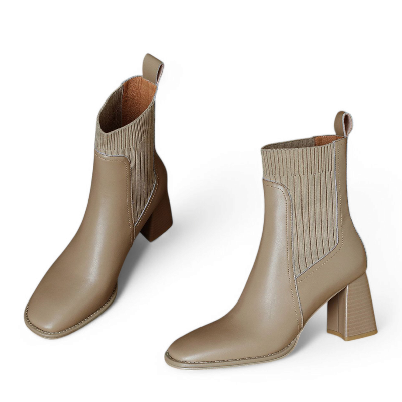 Front-facing view showing the structured square toe and smooth dark beige leather texture.
