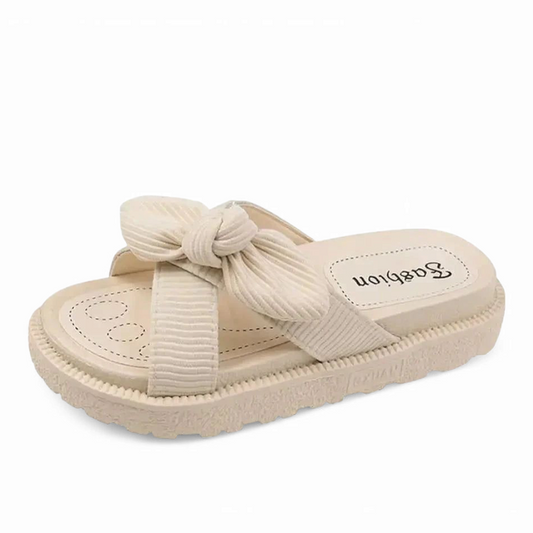 Light-beige version with ribbed fabric bow and tone-on-tone rubber sole.