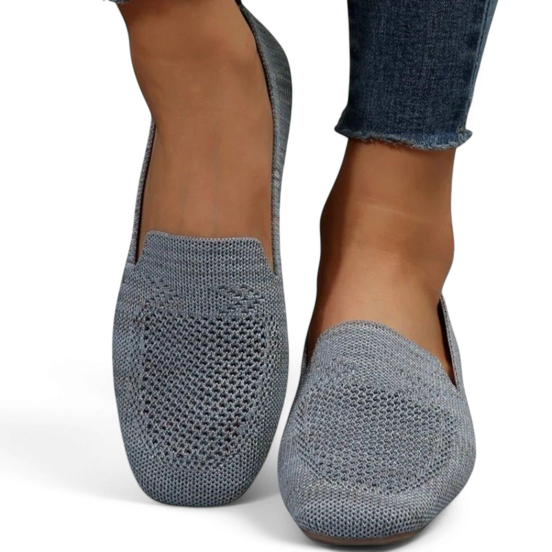 Front on-foot view showing the breathable knit vamp and shallow cut.