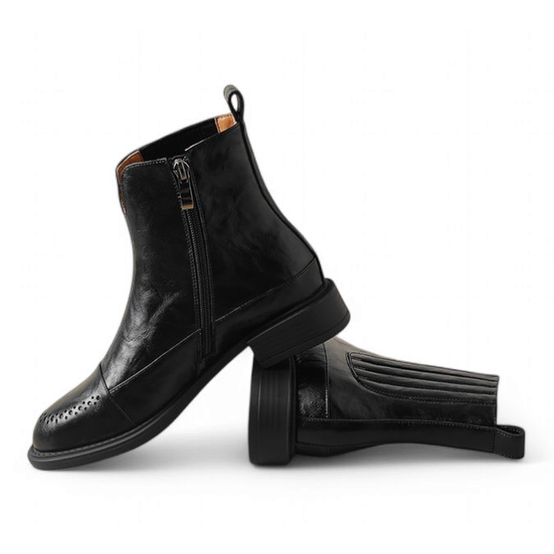 Men’s Chelsea boots in black with round toe and medium heel