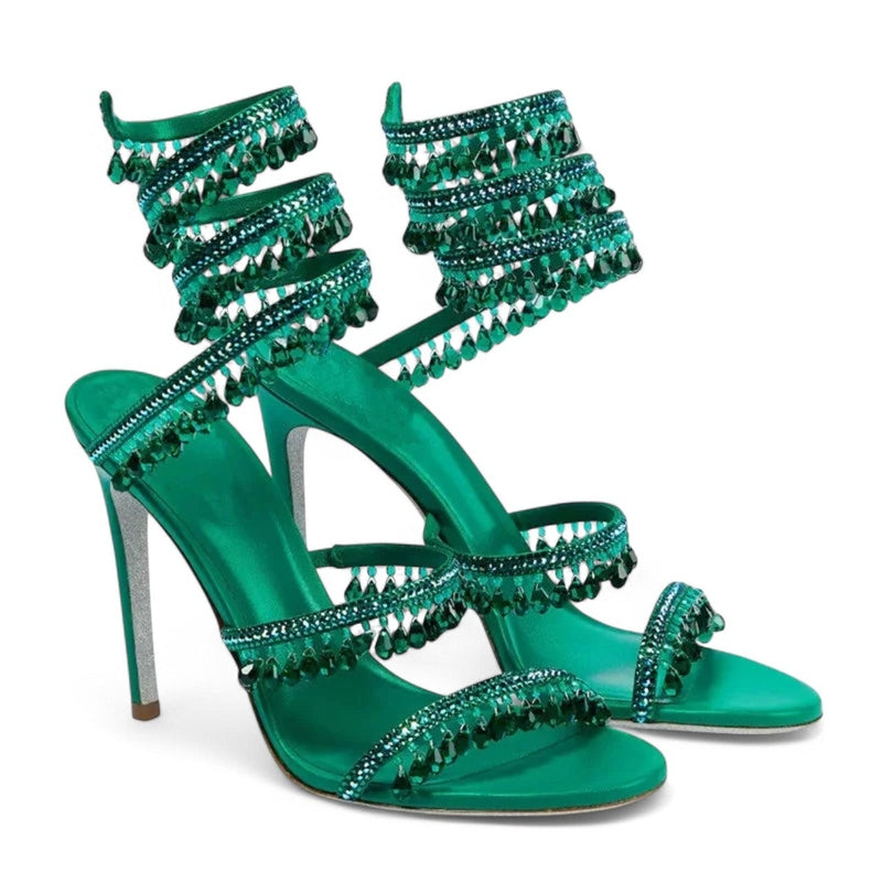Pair of green satin sandals with wrap‑around crystal straps, front angle