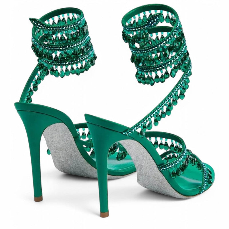 Rear view of green satin sandal with spiral crystal straps and high stiletto heel	