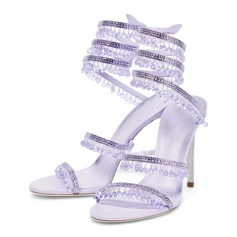 Side detail of lilac sandal showing layered crystal straps and open toe