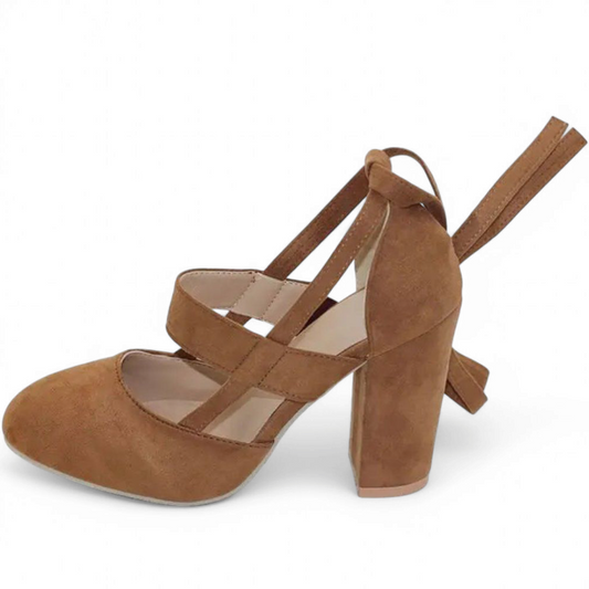 Camel-brown shoe in side profile highlighting suede texture and block heel.