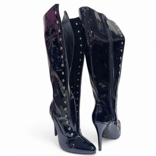 Angled view of both boots, one facing front and the other showing the back with laces and zipper