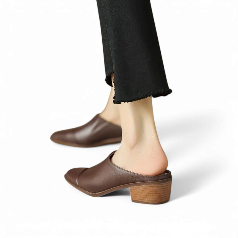 Rear angle on-foot view of brown mule showing block heel.