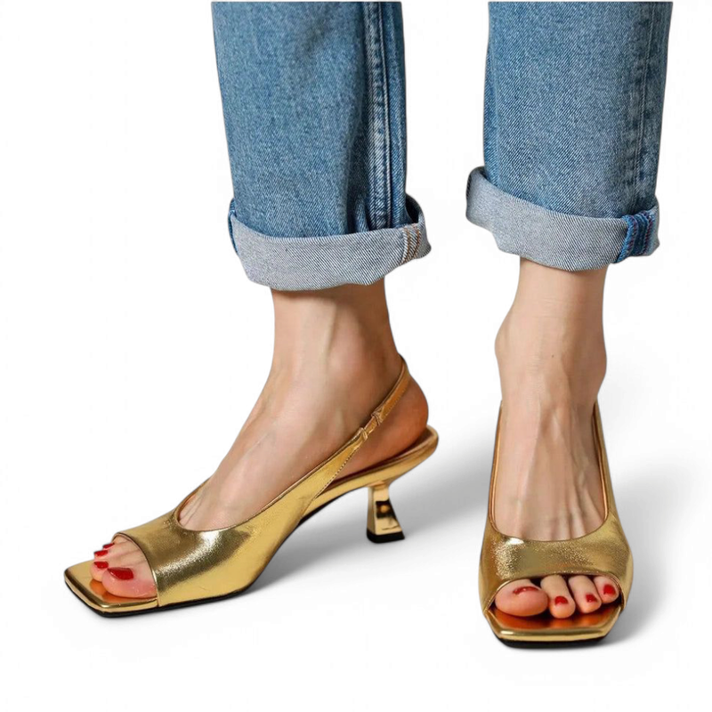 Gold kitten-heel pump with open toe shown at front-side angle, white background