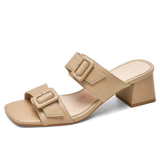 Left-side profile of the beige sandal against white.
