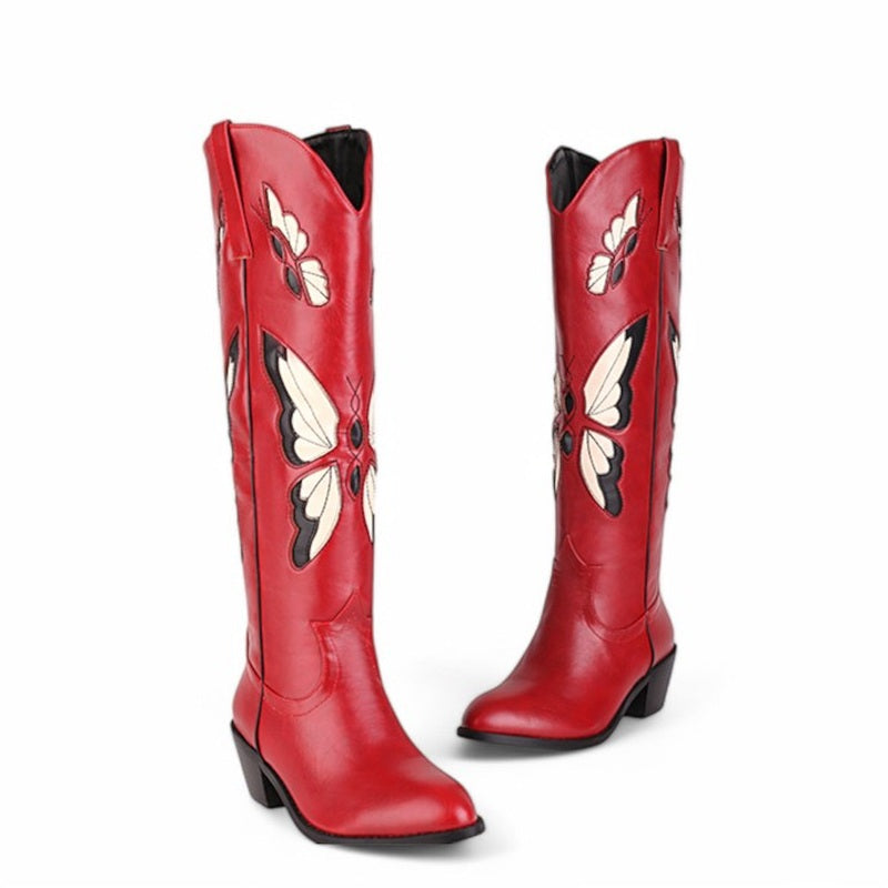 Red leather boots with cream and black butterflies, shown front and side.

