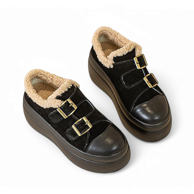 Black pair with black cap toe, ivory shearling collar, twin brass buckles; black platform