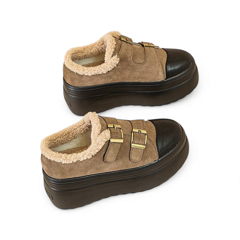 Brown pair with ivory faux-shearling collar, twin straps, black platform sole.