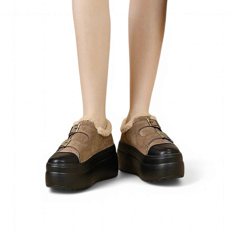 On-foot front view of brown shoe; high platform, soft shearling collar.