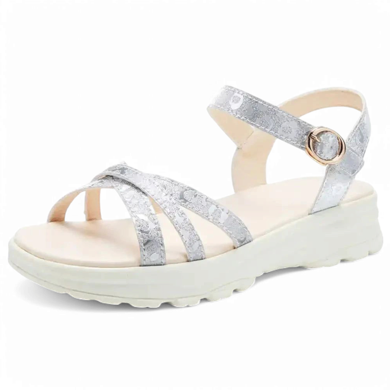 Westar patterned straps on a ridged cream sole, side profile.