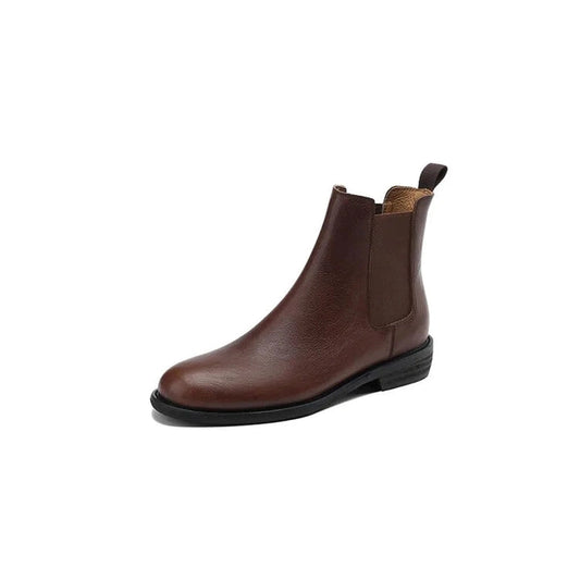 side view of Merendy Salahyan Chelsea boots in brown leather, featuring a rounded toe and visible stitching along the vamp.