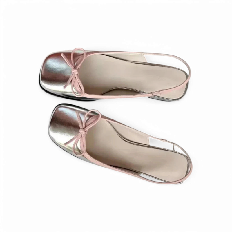 Top view, silver pair slightly staggered, showing square toes and slim slingback straps.	