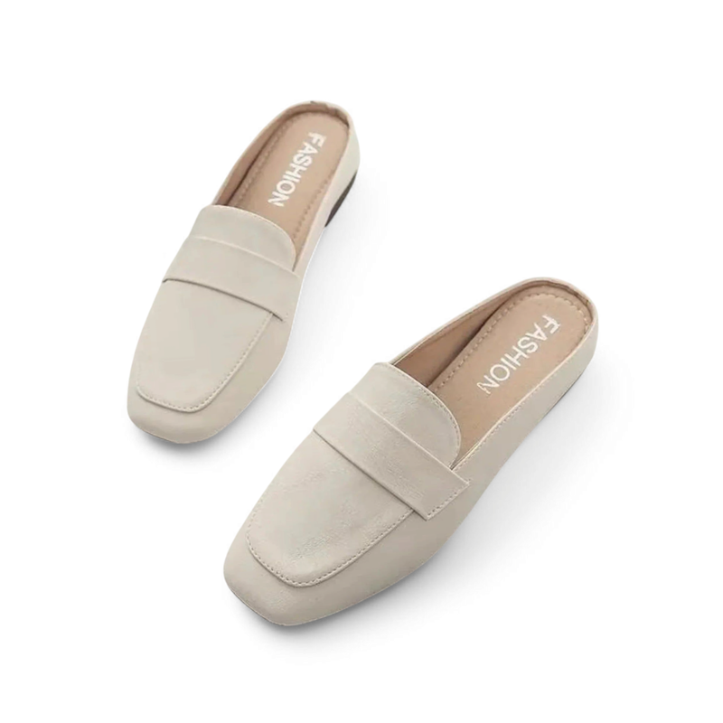 Top view of the ivory/snow Merendy Snow slip-on square-toe flat mules.