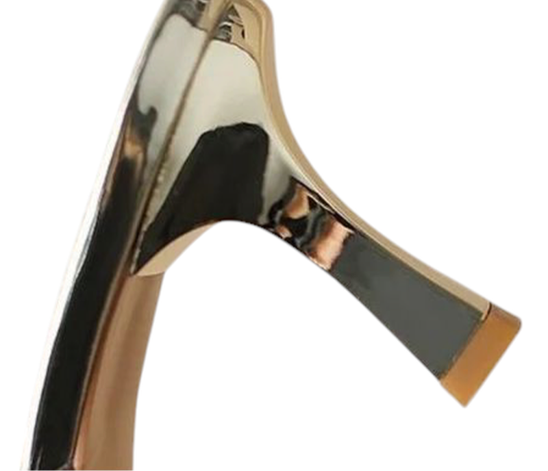 Close-up of the shiny gold kitten heel with flared base and rubber tip.