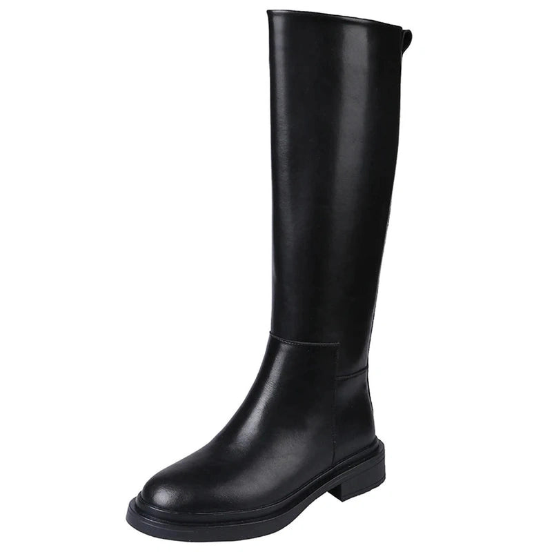 Front view of a single Merendy Sustate black knee-high boot, highlighting its smooth leather surface and classic rounded toe.