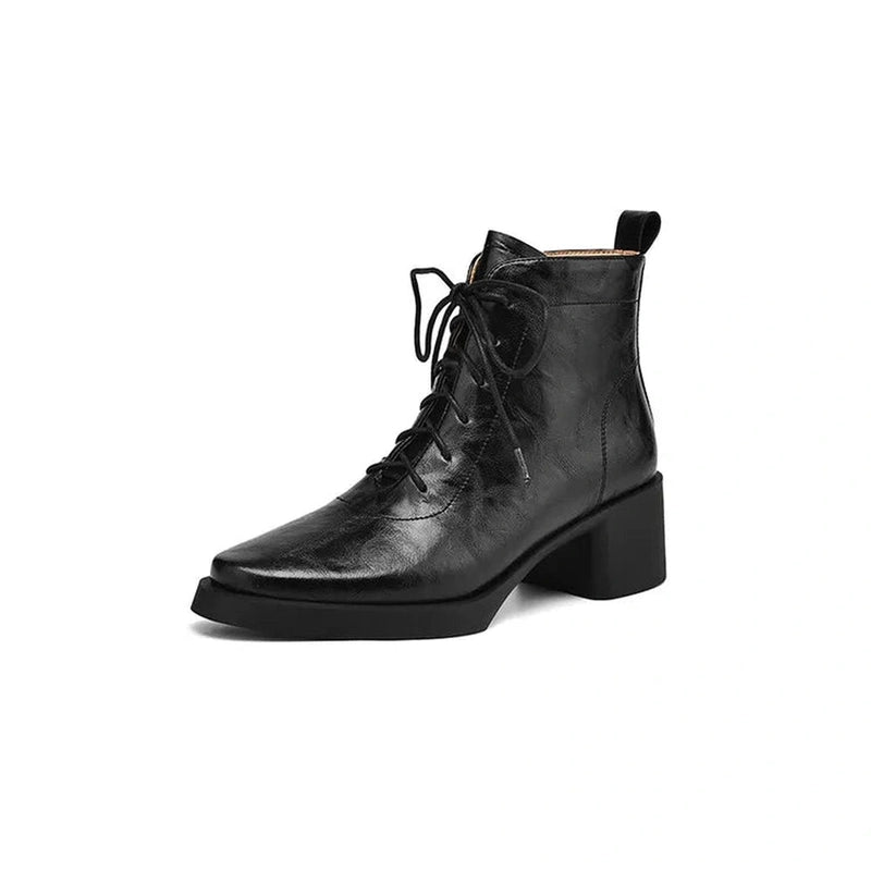 Side view of Merendy Tarek black leather Victorian boots with lace-up closure, round toe design, and 5cm square heel.