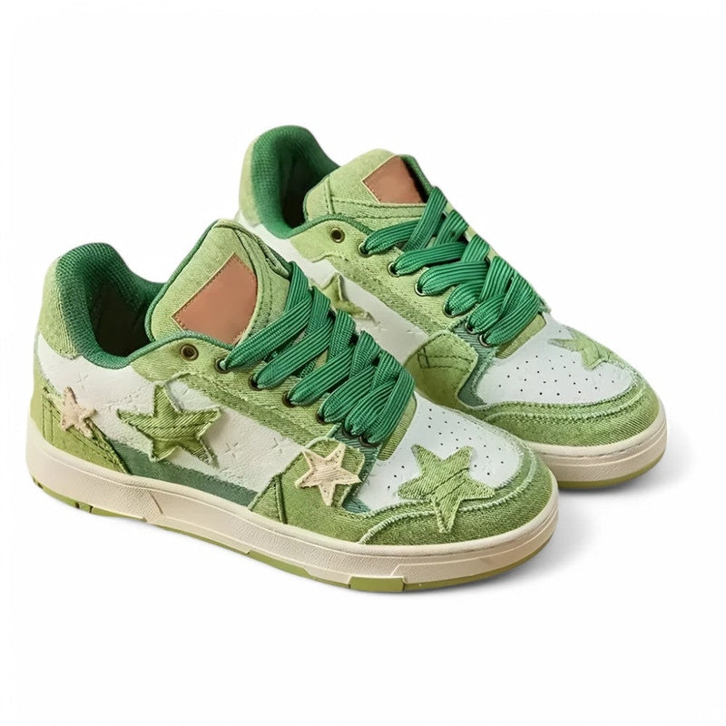 Green sneaker pair in fresh tones, thick laces and embroidered stars on sides.


