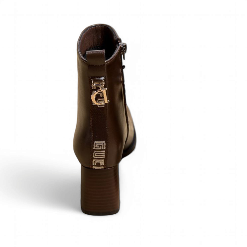 Brown leather boot with mid wooden heel, rear view highlighting logo tape and gold ring.

