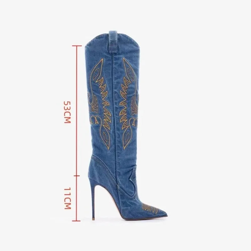 Denim boot displayed with height measurements—53 cm shaft and 11 cm heel, with bold decorative stitching.

