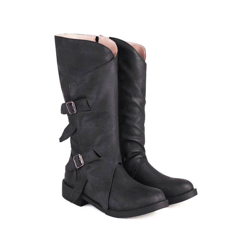 Two matching black boots side by side, showing consistency in finish and structure