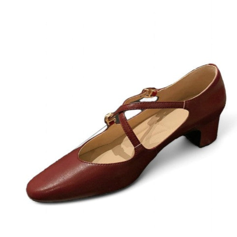 Burgundy Mary-Jane with mid heel, low-light side studio view against white.