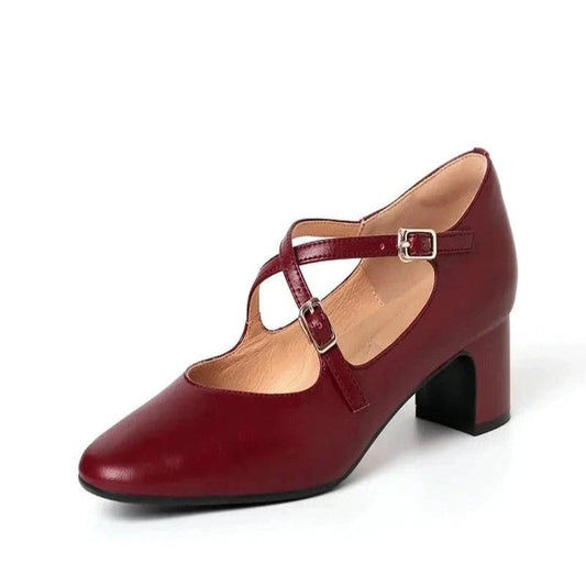 Burgundy leather Mary-Jane with medium block heel and twin silver buckles, crisp side studio view.