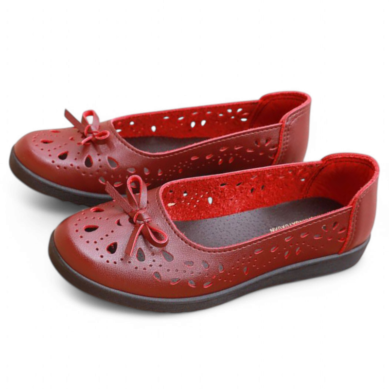 Front-angled red pair showing toe box and matching bows.