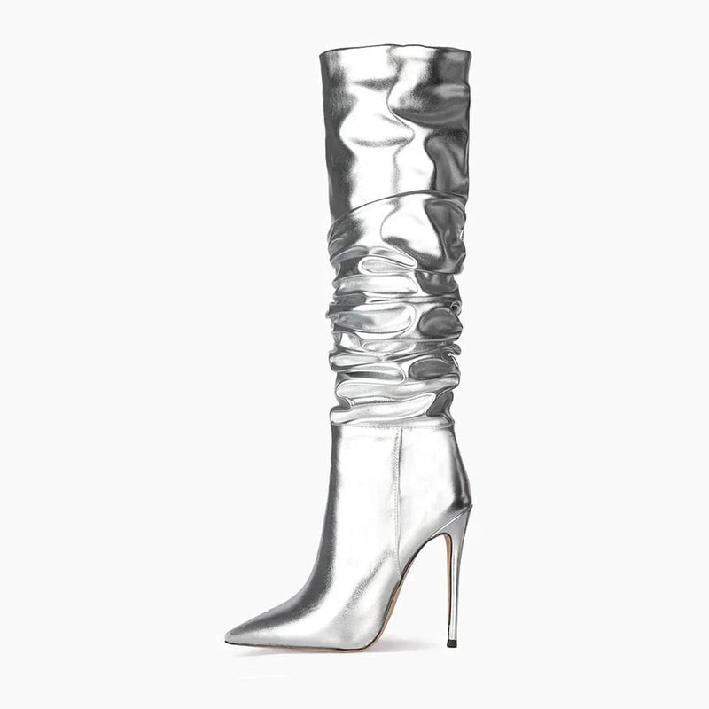 Silver metallic ruched knee-high boot with tall slim heel, side view.