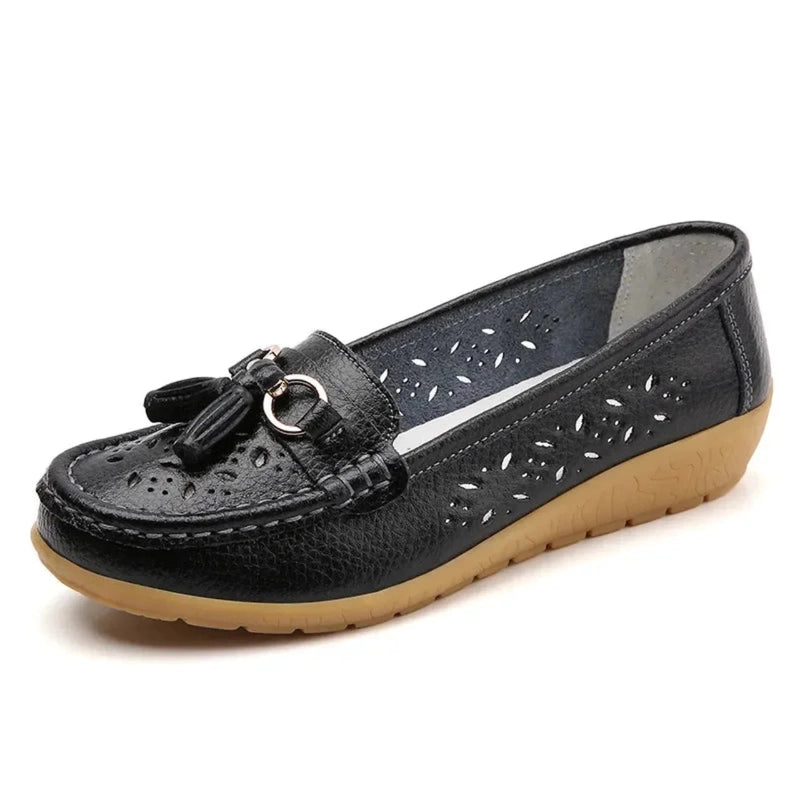 Black square‑toe tassel loafer, side profile on white background