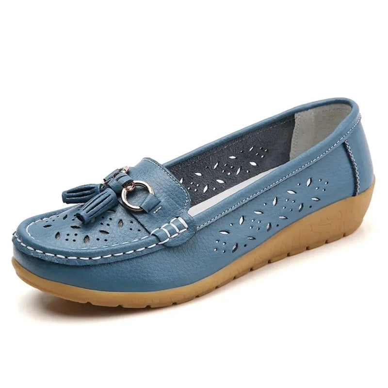 Sky‑blue perforated loafer, stitched vamp detail