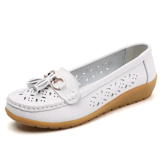 White square‑toe loafer, tassels and silver ring accent