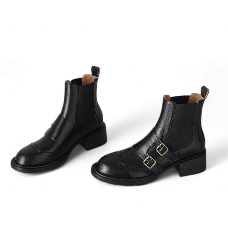 Profile shot showing marmosh chunky square heel and stylish belt accent on the side.

