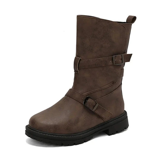 Side profile showcasing the overlapping leather straps and low square heel brown boot