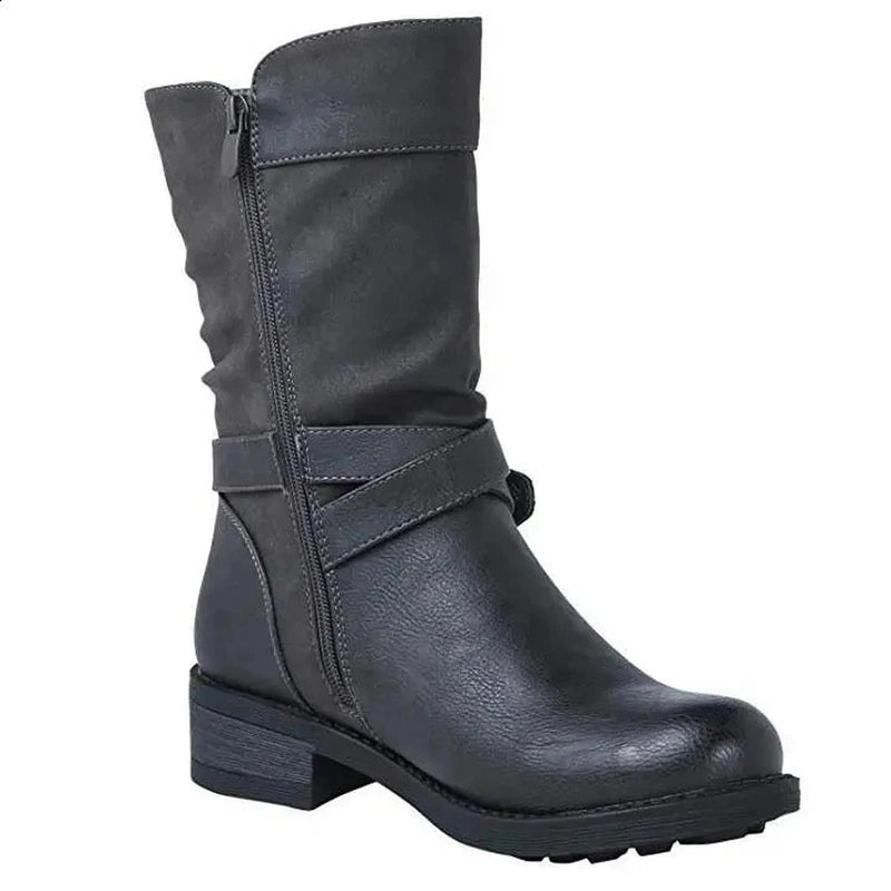 Studio side shot of the black Merendy Santos boot with a round toe and clean, tailored shaft.