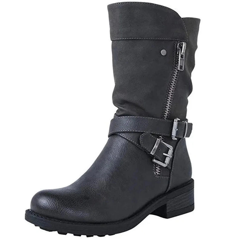 Studio side shot of the black Merendy Santos boot with a round toe and clean, tailored shaft.