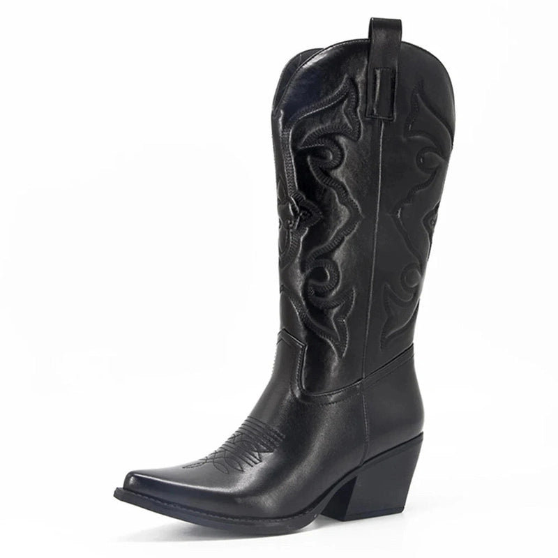 Matte black western boot with raised embroidery, pointed toe and chunky heel.
