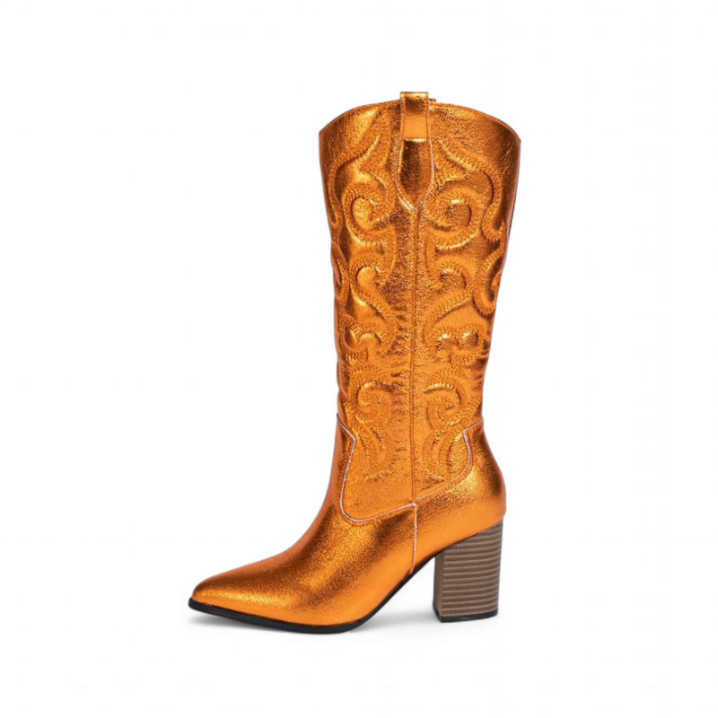 Burnt-orange metallic boot with bold stitching and brown block heel.
