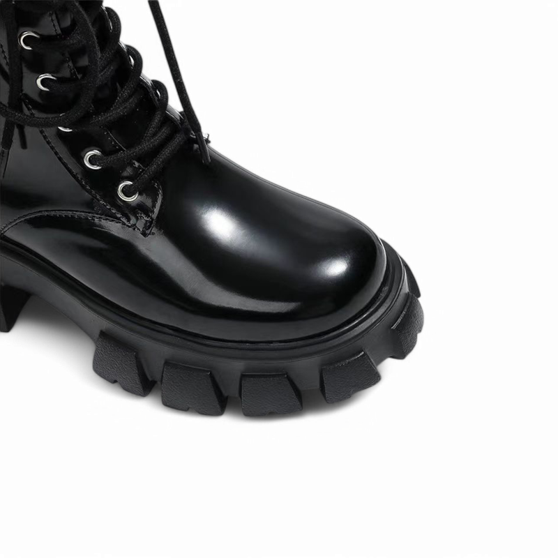 Image highlighting the boot's front and thick outsole details.