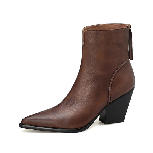A single brown leather ankle boot with pointed toe and block heel, displayed on a white background.

