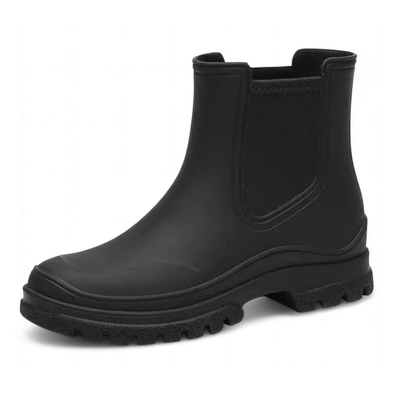 Side profile of a black waterproof Chelsea boot with a rugged sole and smooth finish.