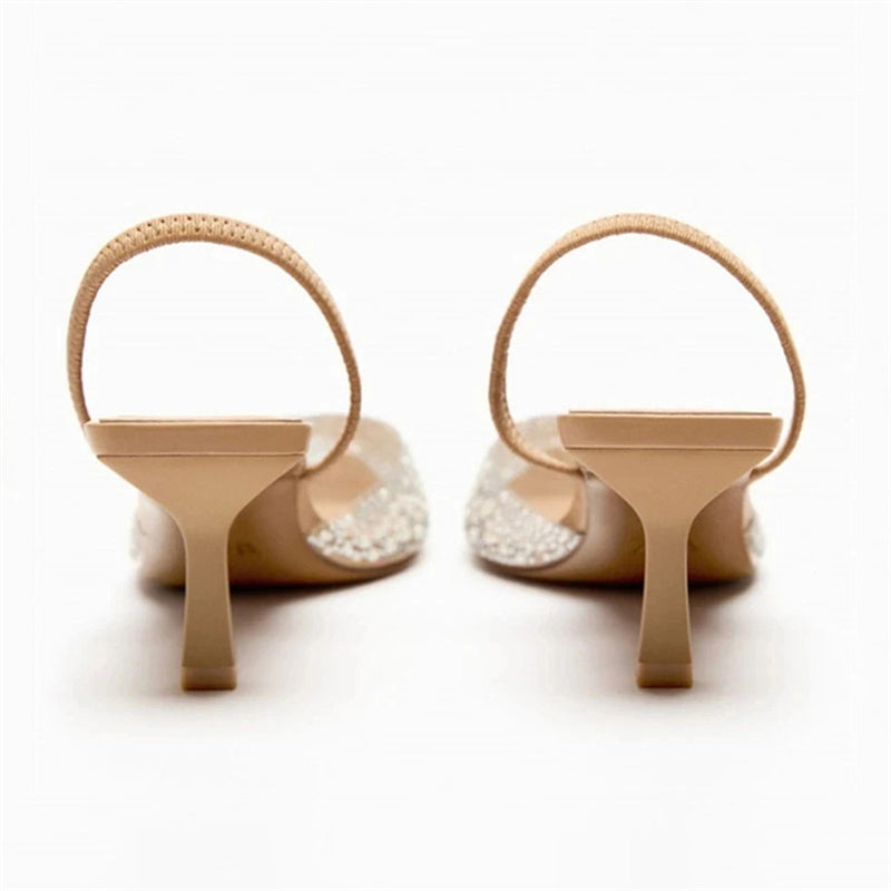 Rear view of pearl shoe showing sculpted heel and thin strap
