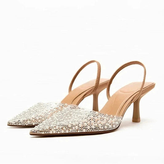 side view of pearl slingback with mid kitten heel