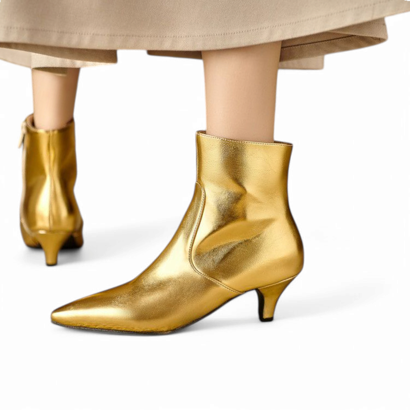 Rear and side view of gold boot showing zipper pull.