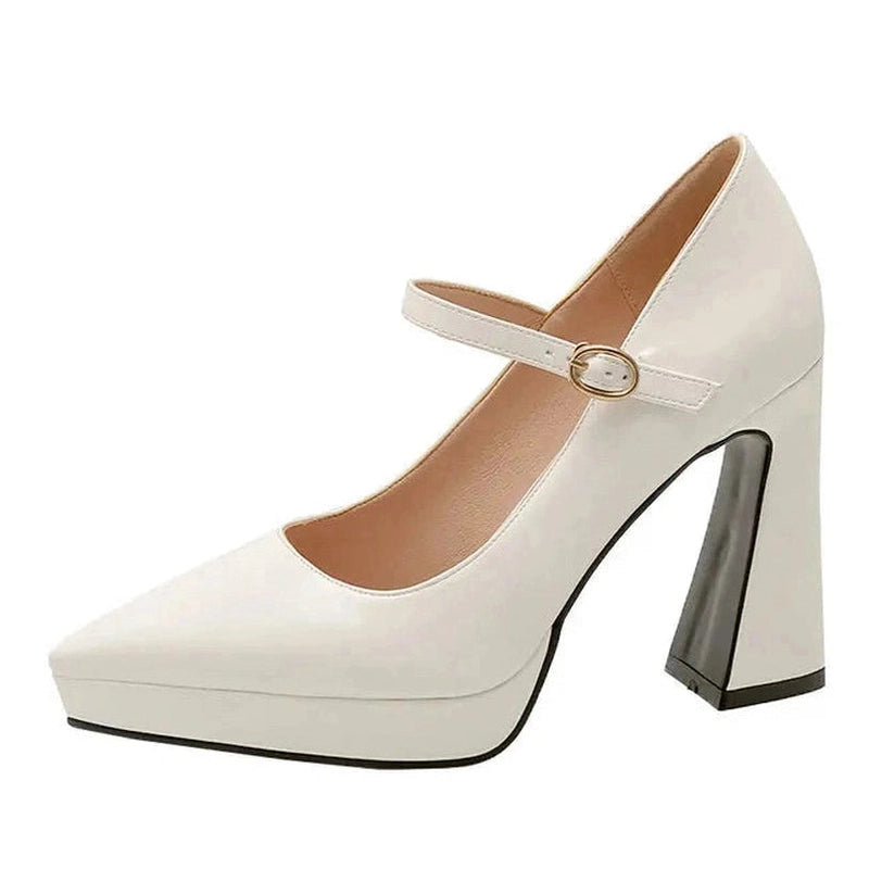 Side view of ivory Mary-Jane pump with platform sole and chunky heel.