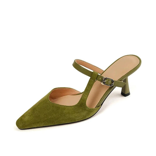 Green suede Warda mule with kitten heel and pointed toe.


